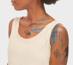 Black Girl with a lot of temporary tattoos